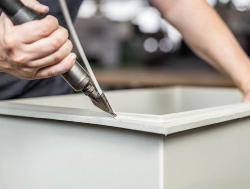 Warmluftschweissen an einem Behälter aus Standardkunststoff